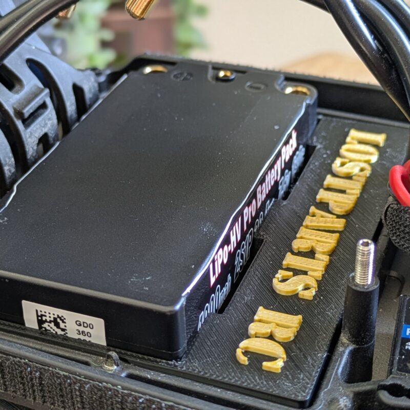 Battery tray for Team Associated B5/B5M designed to hold 46.7x92.7mm LiPo without foam
